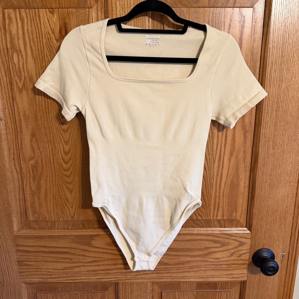 OQQ Elegant Cream Short Sleeve Bodysuit